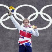 Great Britain's Bethany Shriever collects her Gold medal for the Cycling BMX Racing. All photos: PA