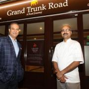 Rajesh Suri and Dayashankar Sharma outside their then new restaurant Grand Trunk Road