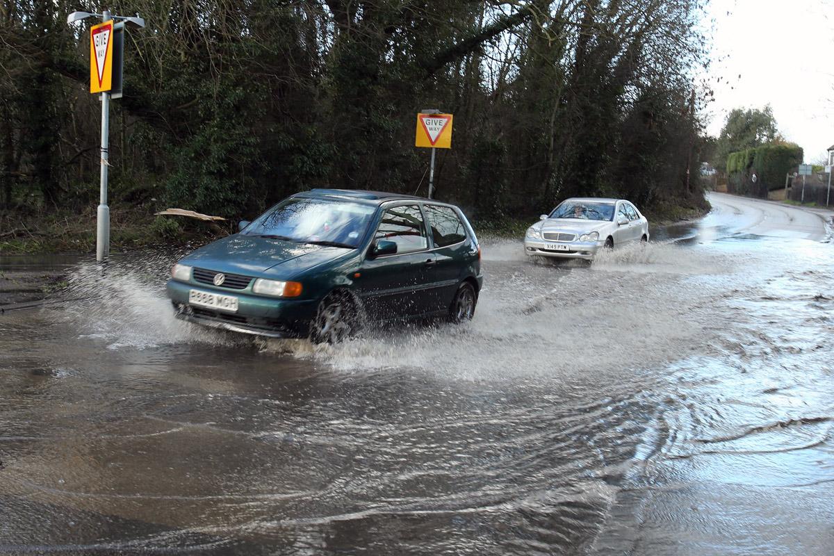Flooding on the B181 Epping Road at the junction of Common Road. Jack's Hatch. (7/2/2013) EL75097_3