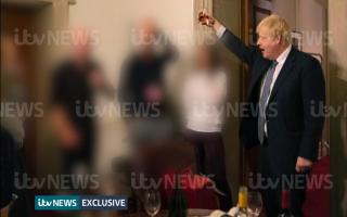 ITV handout photo dated 13/11/20 of a photograph obtained by ITV News of the Prime Minister raising a glass at a leaving party on 13th November 2020, with bottles of alcohol and party food on the table in front of him. Issue date: Monday May 23, 2022.