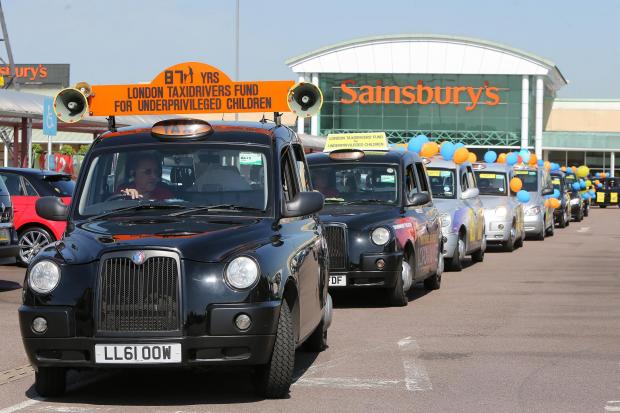 The convoy leaving the Low Hall Sainsbury's store in Chingford
