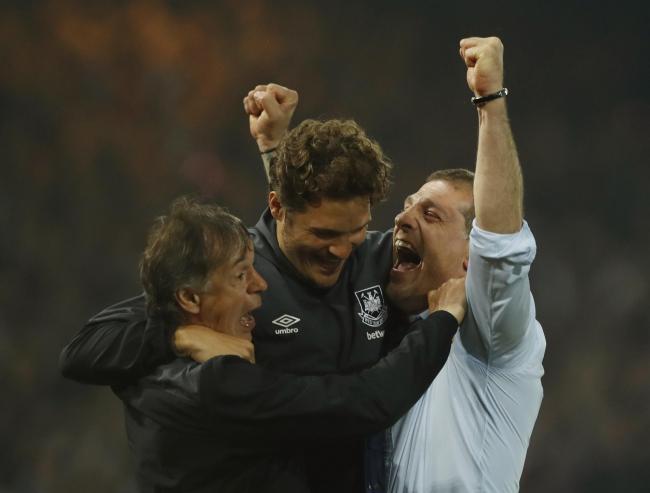 A jubilant Slaven Bilic celebrates with his staff. Picture: Action Images